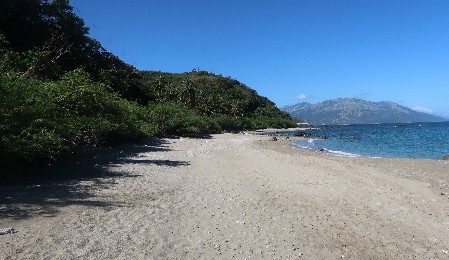 Diumanod beach, Brgy. Udalo, with Abra de Ilog ferry pier in the far distance The area of the future Marine Turtle Sanctuary at Diumanod Beach